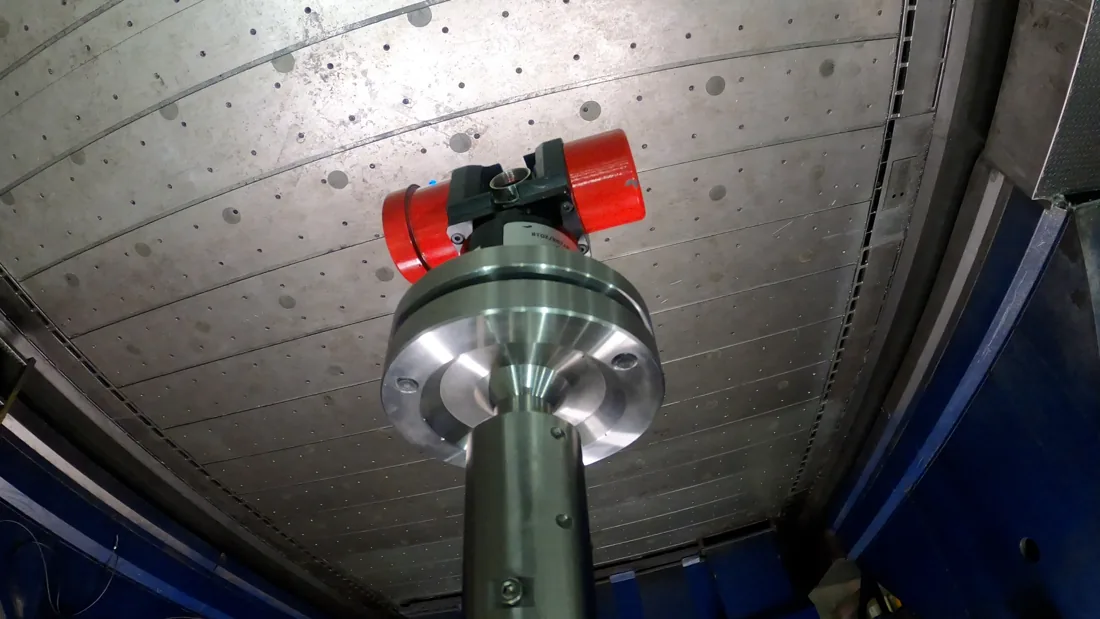 API measurement optics inside a machine tool during volumetric error compensation